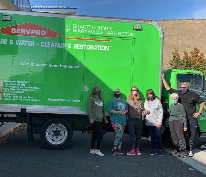 SERVPRO employees pose for a photo.