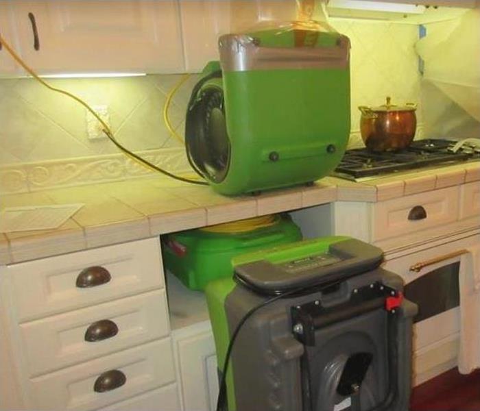SERVPRO restoration equipment being used in kitchen