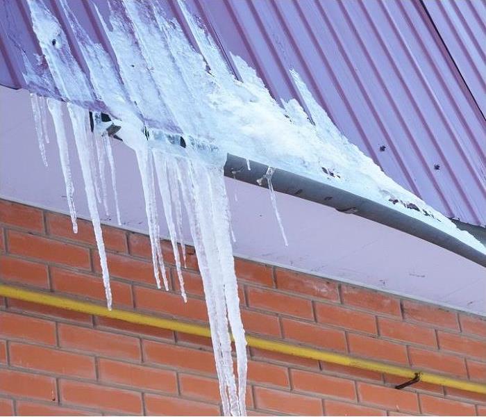 Frozen water, icicles on roof